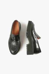 Top and side view of woven loafers