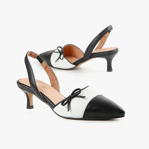 Black and white kitten heel slingback with black bow