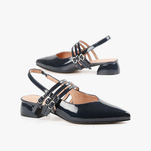 navy patent leather slingback heels with three mary jane straps across top