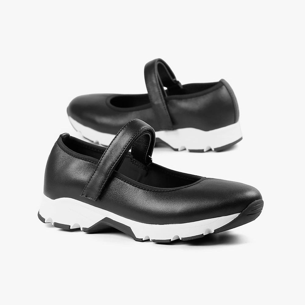 Black leather mary jane with velcro strap and white sneaker sole