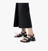 Load image into Gallery viewer, Black sandals worn with black cropped pants