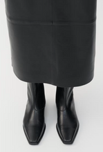 Load image into Gallery viewer, Black ankle boots worn with black leather skirt