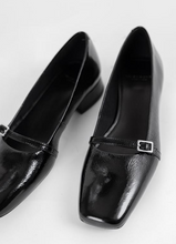 Load image into Gallery viewer, close up of black maryjane style pumps with silver buckle