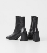 Load image into Gallery viewer, back view of black leather heeled boots