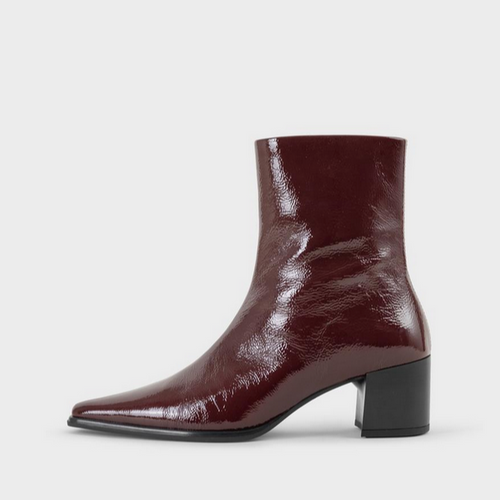 cherry red patent leather boot with black heel side view