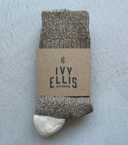 Packaged pair of brown and cream socks