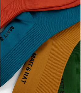 green, orange, yellow and blue socks close-up