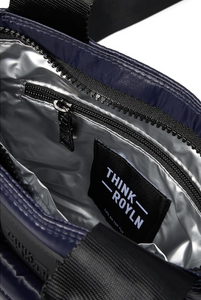 Interior zipper pocket of navy bag