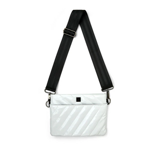 White bag with black strap