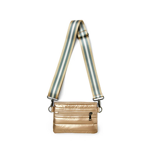 Gold crossbody with striped strap