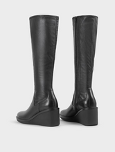 Load image into Gallery viewer, back view of wedge heel on black knee high boots