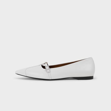 side view of white leather mary janes