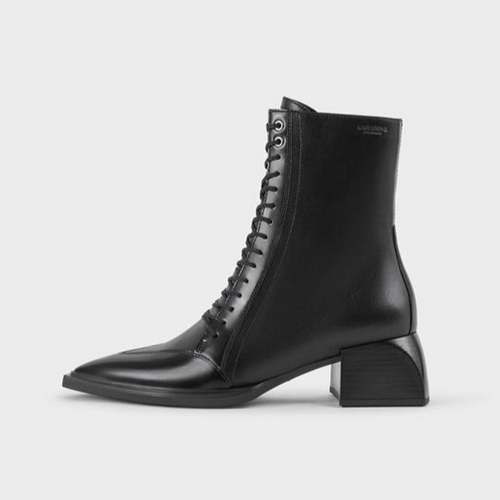 side view of pointed lace up heeled boots