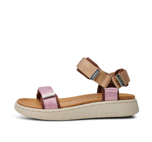 pink and tan sandal with velcro straps side view